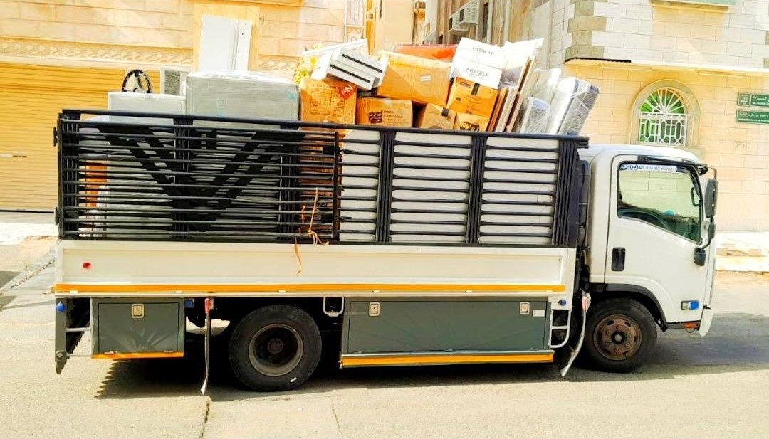 Professional team moving boxes